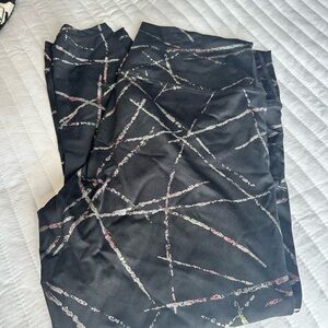 Zyia Active Black Abstract Metallic
Rainbow Stripes Leggings